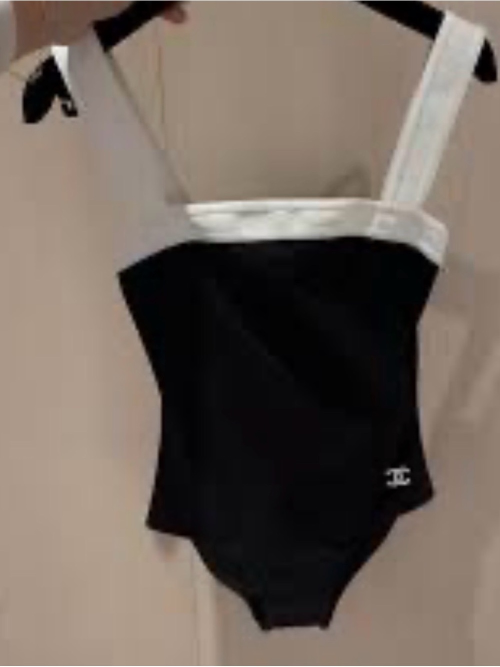 White and black one piece swimming suit